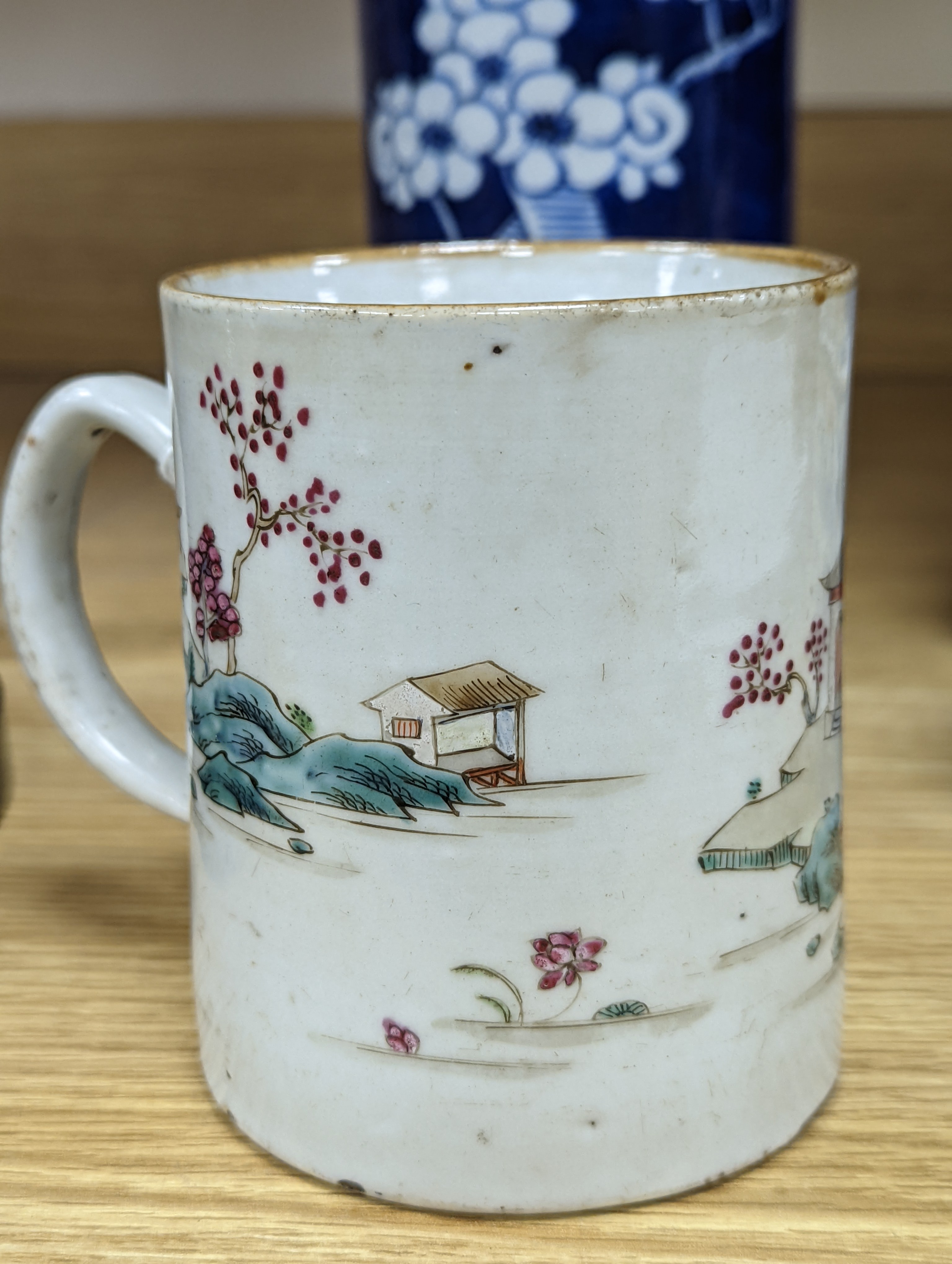 An 18th century Chinese famille rose mug, a Chinese Imari tea caddy and two Chinese blue and white sleeve vases 30cm (4)